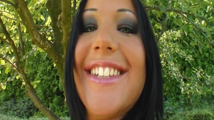 Brunette touches natural boobs