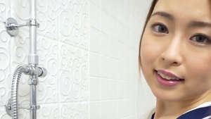 Wet asian girl teasing in bath