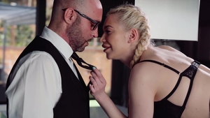 Hard nailining alongside tattooed brunette