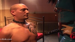 Strapon accompanied by wearing boots