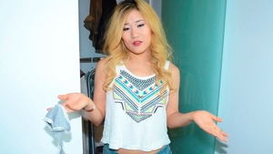 Blonde babe Akemi Rose posing in the bed