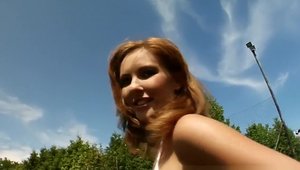 Cute girl getting a facial in public