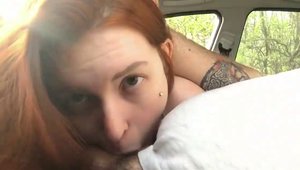Petite redhead sucking cock in public