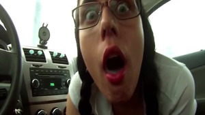 Masturbating in the car between schoolgirl wearing glasses